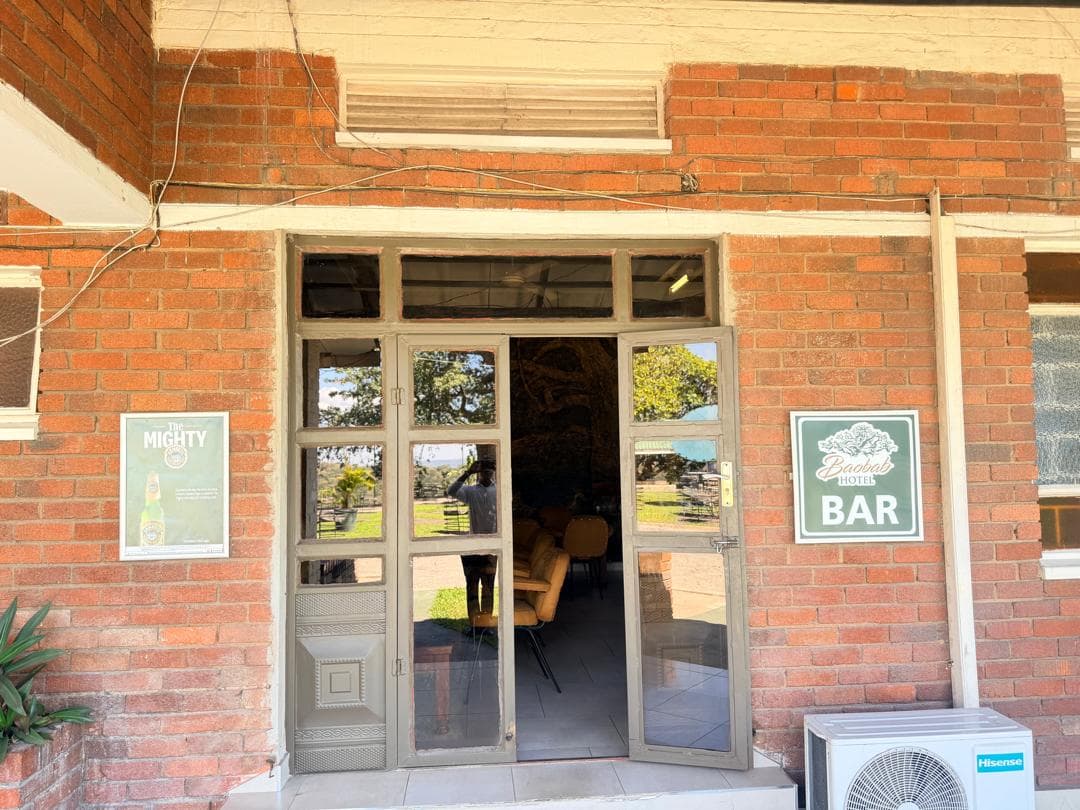 Bar entrance with Baobab Hotel signage
